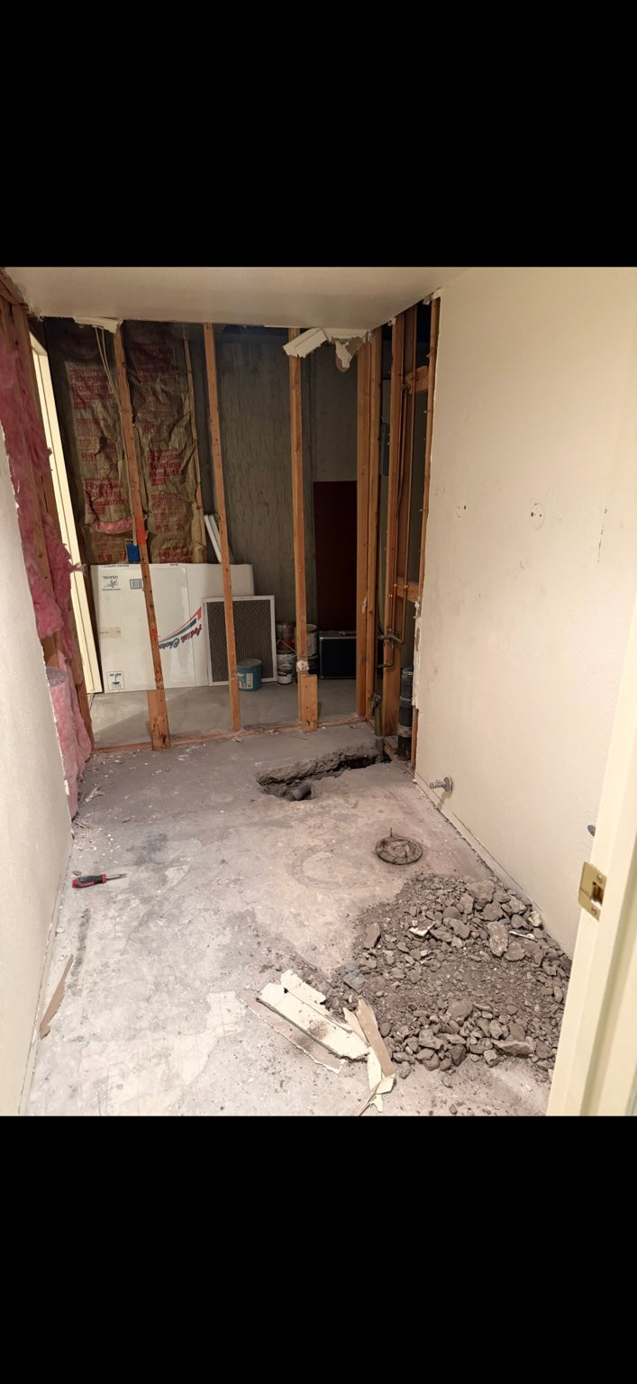 Before — Underground work, reconstruction, and finish brought together in one room.
