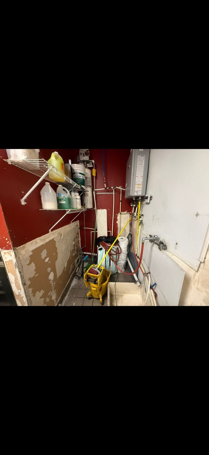Before — A crowded utility area rebuilt around a complete treatment system.