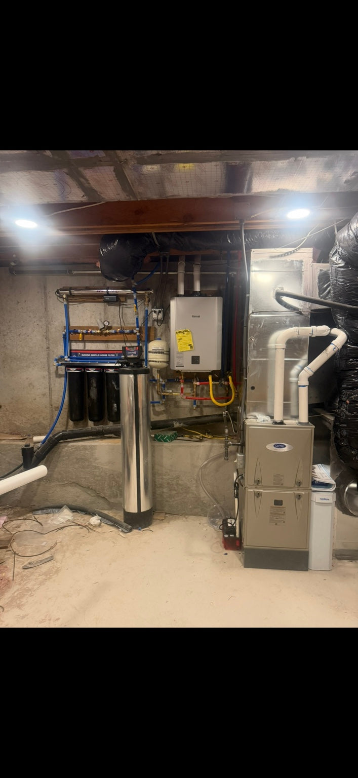 After — From an empty mechanical wall to a purpose-built water system.